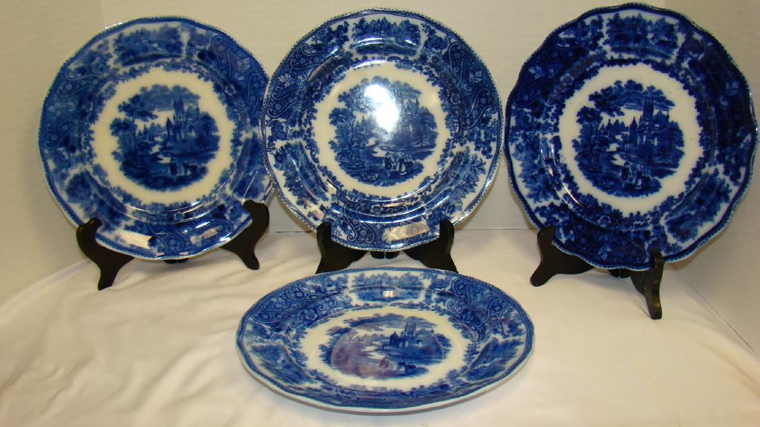 FLOW BLUE NONPAREIL BY BURGESS & LEIGH DINNER PLAT: FLOW BLUE NONPAREIL DINNER PLATES - 4 IN ALL - 9 & 7/8 IN IN DIAMETER - STAMPED ENGLAND NONPAREIL BURGESS & LEIGH DOLEPORT POTTERY - SOME FLAWS - 1 PLATE HAS SMALL CRACK
