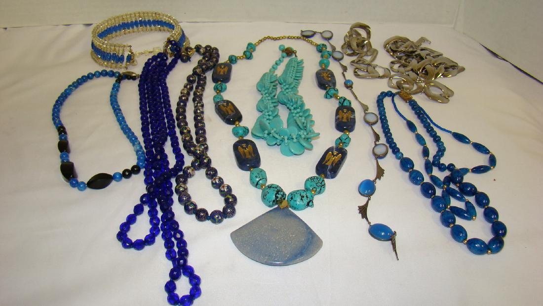 LADIES NECKLACES AND MORE IN SHADES OF BLUE: LADIES NECKLACES - POSSIBLE TURQUOISE AND SODALITE NECKLACE - SODALITE STONES HAVE ANGELS CARVED INTO THEM - LARGE LIGHT BLUE STONE PENDANT AND GOLD TONE ACCENT BEADS - 26 IN LONG - SILVER TONED CABLE