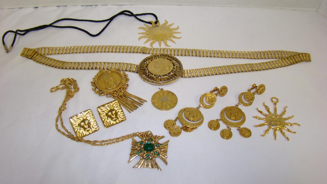 ROMAN INSPIRED GOLD TONED JEWELRY: ROMAN INSPIRED GOLD TONED JEWELRY - GOLD TONED METAL BELT WITH ROMAN SOLDIER MADALION CLOSURE - CLIP ON EARRINGS WITH ELIZABETH REGINA - 2 1/2 IN SUN PENDANT - ZODIAC PENDANT - SQUARE LION PIERCED EAR