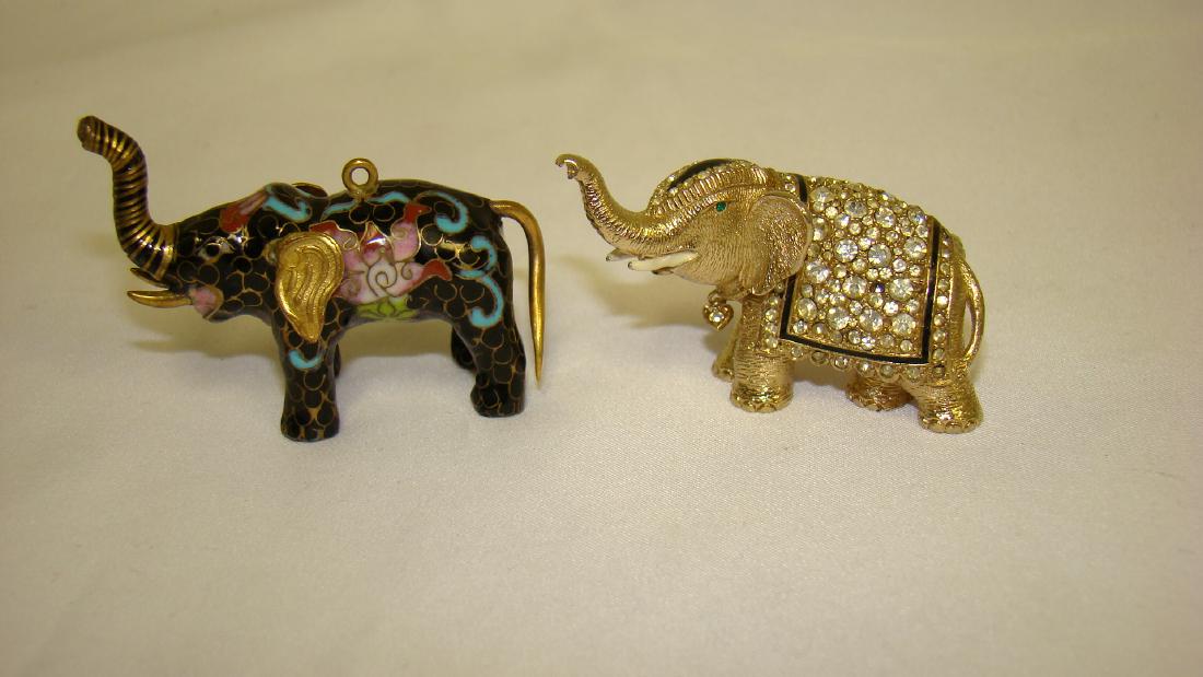 VINTAGE CINER ELEPHANT PIN AND PENDANT: VINTAGE ELEPHANT CINER PIN AND COISSONE STYLE PENDANT - PIN IS GOLD IN COLOR WITH WHITE AND BLACK RHINESTONES - MISSING ONE WHITE RHINESTONE - PENDENT IS BLACK AND MULTI COLORED ENAMEL