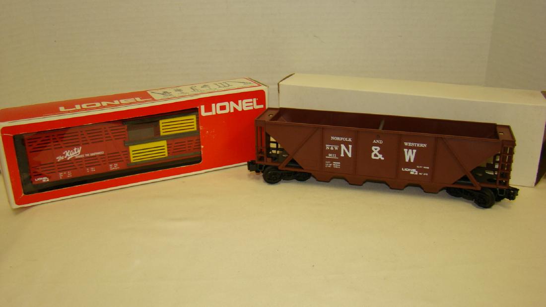 2 LIONEL TRAIN CARS- CATTLE CAR  & LONG HOPPER (1 of 6)