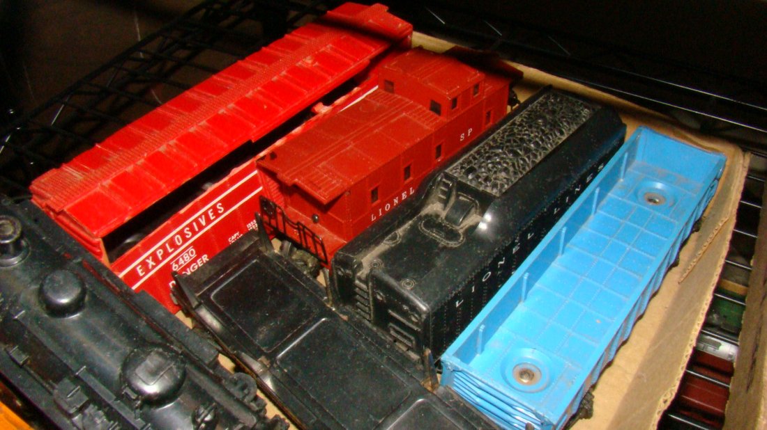 LIOINEL TRAIN CARS, TENDER AND ENGINES: LIONEL TRAIN CARS AND ENGINES - 1060 ENGINES NEED WORK NO INARDS - CAR 63132, 6480 - EXPLOSIVE CAR, 6357 CABOOSE, SANTA FE ENGINE -SHELL, AND TENDER