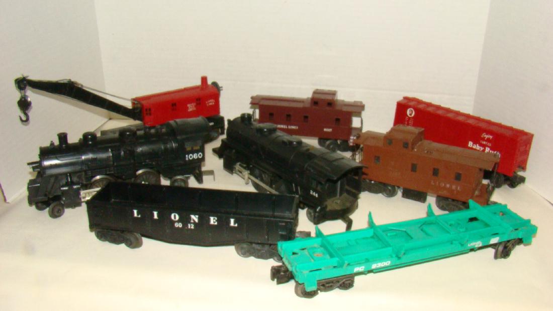 LIONEL TRAIN ENGINES, CARS, AND CABOOSE (1 of 9)