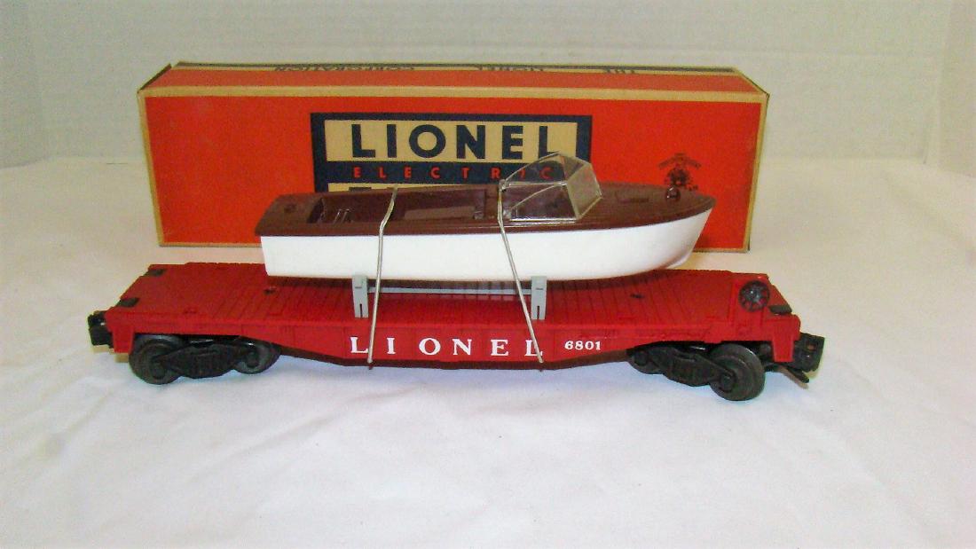 LIONEL 6801 FLAT CAR WITH BOAT: LIONEL 6801 FLAT CAR WITH BOAT-NICE CONDITION WITH ORIGINAL BOX -NO MAJOR ISSUE WITH BOX-STICKER TEAR-EDGE WEAR TO BOX-VERY CLEAN FOR AGE