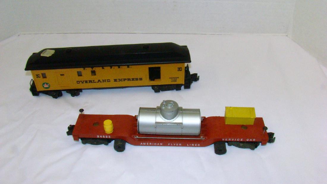 AMERICAN FLYER ROCKET AMERICAN FLYER SERVICE CAR 2: AMERICAN FLYER ROCKET AMERICAN FLYER SERVICE CAR 24533 AND OVERLAND EXPRESS- USED NICE CONDITION=SERVICE CAR WILL NEED FOAM REPLACED-PLASTIC OVERLAND EXPRESS 30 APPEARS CLEAN WITH ORIGINAL RETAIL STIC