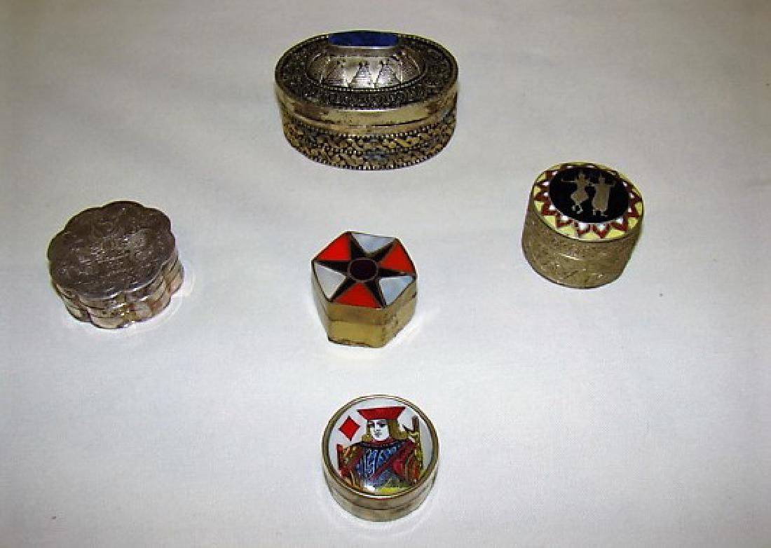 5 SIAM SILVER AND OTHER BOXES: 3 OVAL ENGRAVED SIAM SILVER STYLE BOX WITH BLUE STONE-2 FLOWER SHAPED METAL BOX MARKED MMA ON BOTTOM AND 3 VARIOUS MINIATURE DECORATIVE METAL BOXES