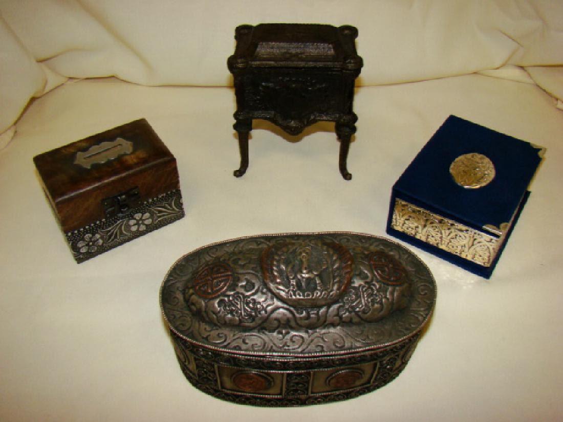 4 VARIOUS DECORATIVE BOXES: 5X4.5'' CAST METAL HINGED BOX-SERRV WOOD AND METAL BANK BOX-7 OVAL SIAM SILVER COVERED BOX AND A MARY ARGENTINO METAL TRIMMED COVERED BOX