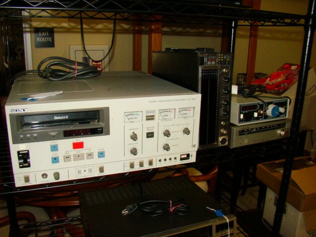 SHELF VARIOUS REALISTIC, SONY AND OTHER STEREO PIECES: SHELF VARIOUS STEREO ITEMS - SONY SLO-1800 BETA VIDEO CASSETTEN RECORDER - NOT TESTED - AUDIO CONTROL THIRD OCTAVE TIME SPECTRUM ANALYZER #SA3050 - NOT TESTED - LOFTECH SINE WAVE GENERATOR AND A REALI
