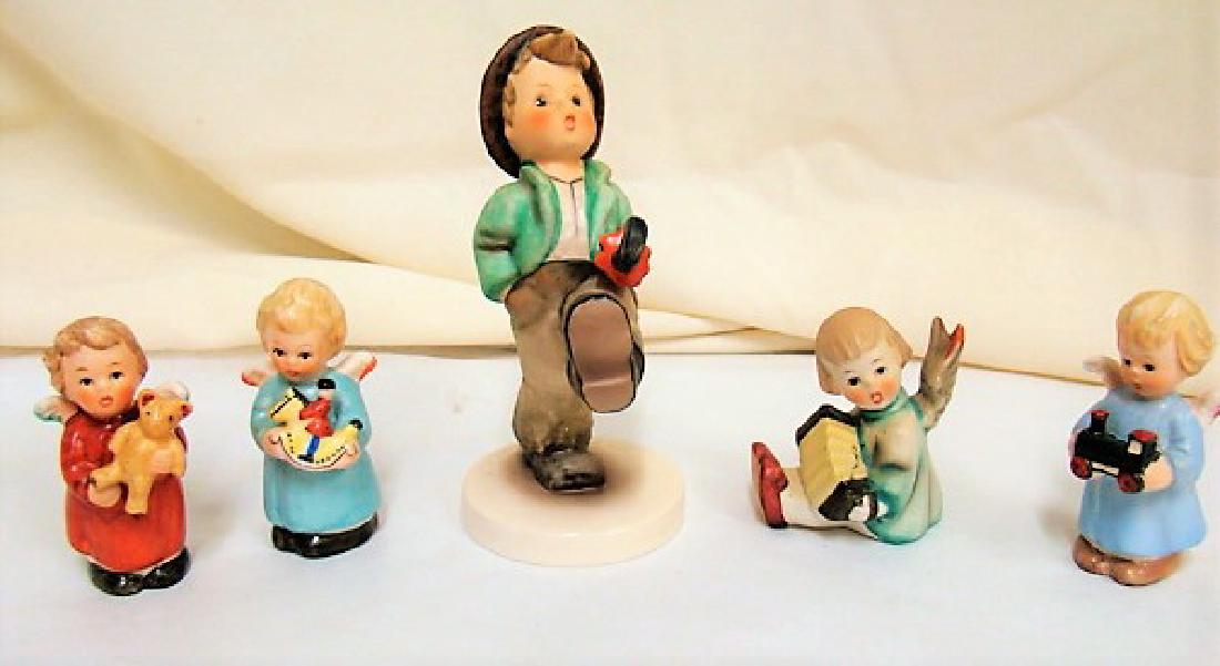 HUMMEL AND GOEBEL FIGURINES: HUMMEL AND GOEBEL FIGURINES-3 GOEBEL AND 1 HUMMEL ANGEL AND 109/0 HAPPY TRAVELER HUMMEL FIGURE-APPEAR IN GOOD CONDITION