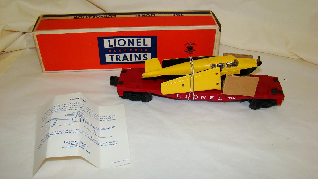 LIONEL FLAT CAR WITH AIRPLANE 6800 - NIB: LIONEL FLAT CAR WITH AIRPLANE 6800 - NIB - YELLOW & BLACK AIRPLANE - INSTRUCTIONS - BOX FLAP TEAR