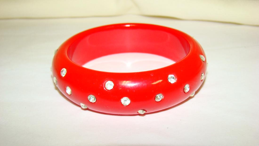 RHINESTONE ACCENTED RED BAKELITE BANGLE (1 of 3)