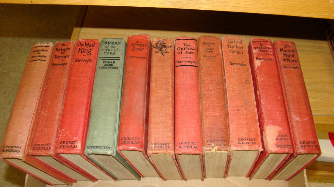 LOT OF VINTAGE HARD COVER BOOKS: LOT OF VINTAGE HARD COVER BOOKS- ALL BY EDGAR RICE BURROUGHS- VARIOUS YEARS- TITLES INCLUDE, THE LAND THAT TIME FORGOT, THE OUTLAW OF TORN, AT EARTH'S CORE, THE MAD KING, THE RETURN OF TARZAN & MORE- 