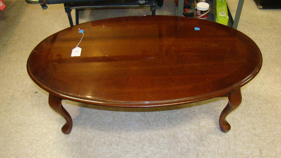 OVAL MAHOGANY COFFEE TABLE: OVAL MAHOGANY COFFEE TABLE - 16HX25WX44L - GOOD CONDITION WITH MINOR WEAR