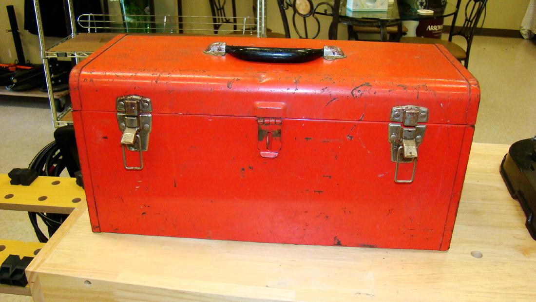 USED RED METAL TOOL BOX WITH HEAVY DUTY SOCKETS: PRE-OWNED RED METAL TOOL BOX - SCRATCHES AND SOME RUST - APPROX. 20 HEAVY DUTY LARGE SOCKETS - TOO HEAVY FOR SHIPPING