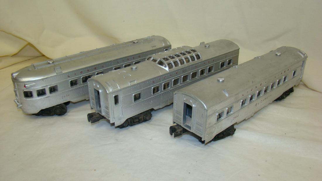 USED LIONEL 2432, 2435 AND 2436 PULLMAN AND OBSERVATION: USED LIONEL 2432 CLIFTON VISTA DOME OBSERVATION CAR - MINOR SCRATCHES - NOT TESTED - 2435 ELIZABETH ILLUMINATED PULLMAN PASSENGER CAR - NOT TESTED - MINOR SCRATCHES AND 2436 SUMMIT ILLUMINATED OBSERVA