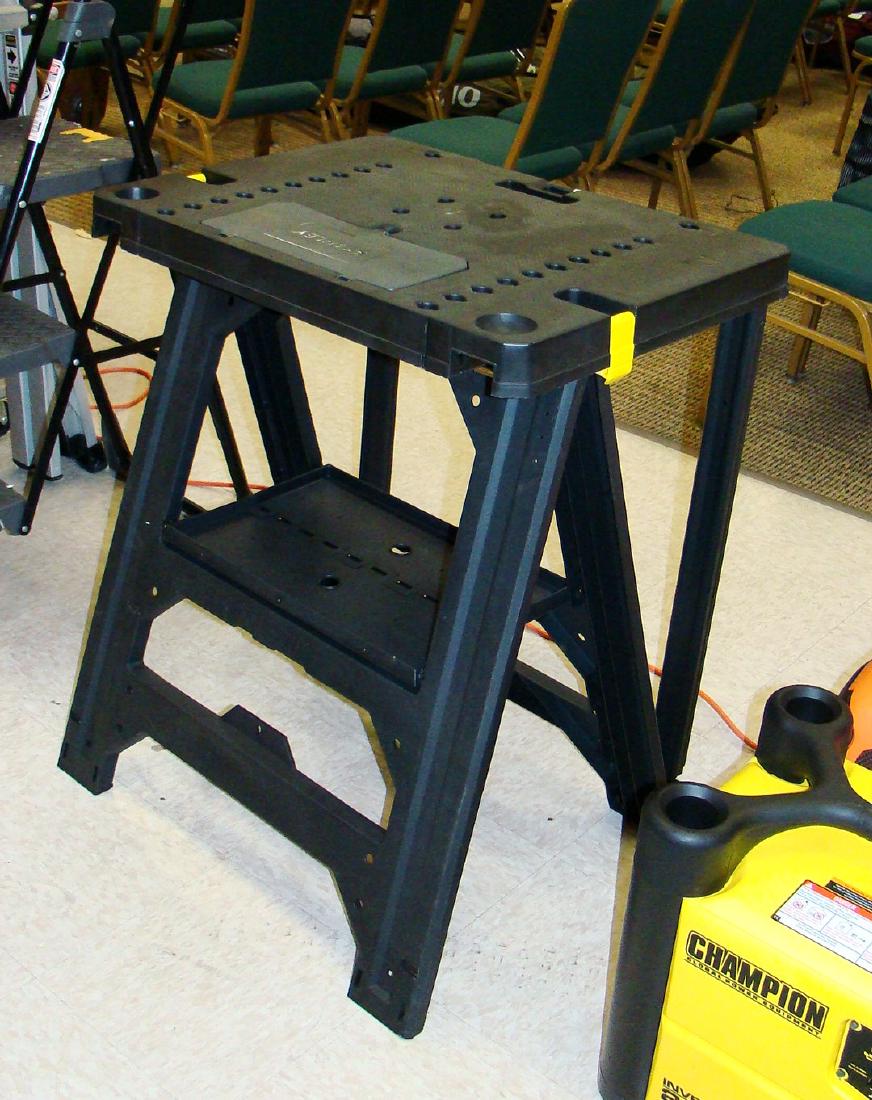 TALL BLACK STANLEY ADJUSTABLE WORK TABLE - FOLDING: PRE-OWNED TALL BLACK STANLEY FOLDING ADJUSTABLE WORK TABLOE - LIKE NEW
