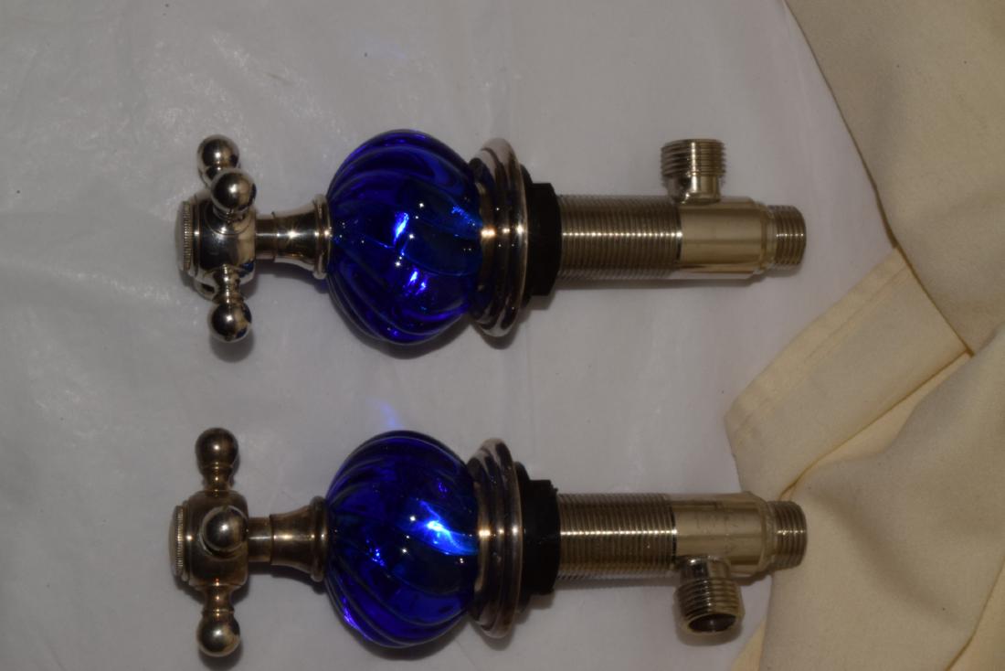KALLISTA BATHROOM FAUCET & FIXTURES: KALLISTA BATHROOM FAUCET & FIXTURES - STUNNING COBALT BLUE GLASS HOT & COLD FIXTURES - SILVER COLORED FAUCET & DRAIN PLUG - APPEARS TO BE IN NEW CONDITION