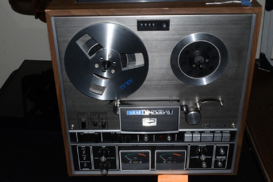 AKAI REAL TO REAL STEREO PLAYER AND TWO NEW BLANK: AKAI REAL TO REAL STEREO PLAYER AND TWO NEW BLANK TAPES IN CARRYING CASE - GX285D DOLBY SYSTEM - TESTED AND WORKS - TWO TAPES ARE LP35, 7'' 1800 FEET - BASF TAPES - ONE OPEN TAPE AND EXTRA REAL - TAPE
