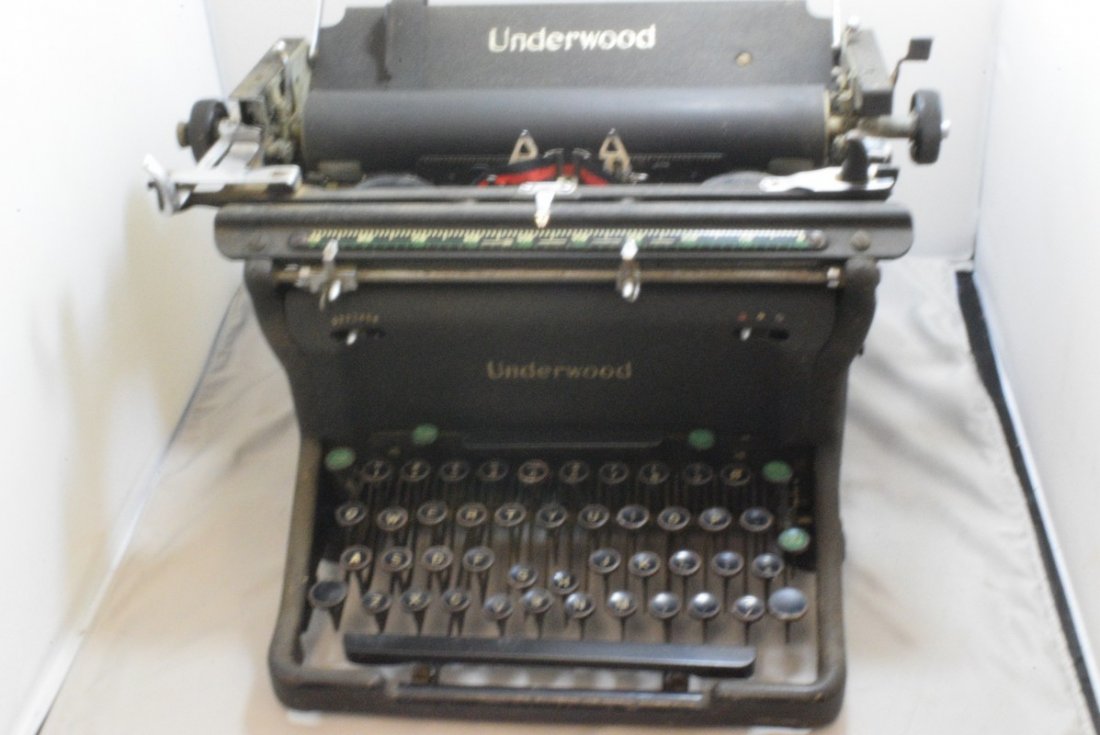 ANTIQUE UNDERWOOD MANUAL TYPEWRITER - KEYS STICK -: ANTIQUE UNDERWOOD MANUAL TYPEWRITER - NEEDS CLEANING - KEYS ARE STICKING - OTHERWISE APPEARS TO BE IN GOOD CONDITION - VERY HEAVY - SHIPPING WILL BE EXPENSIVE