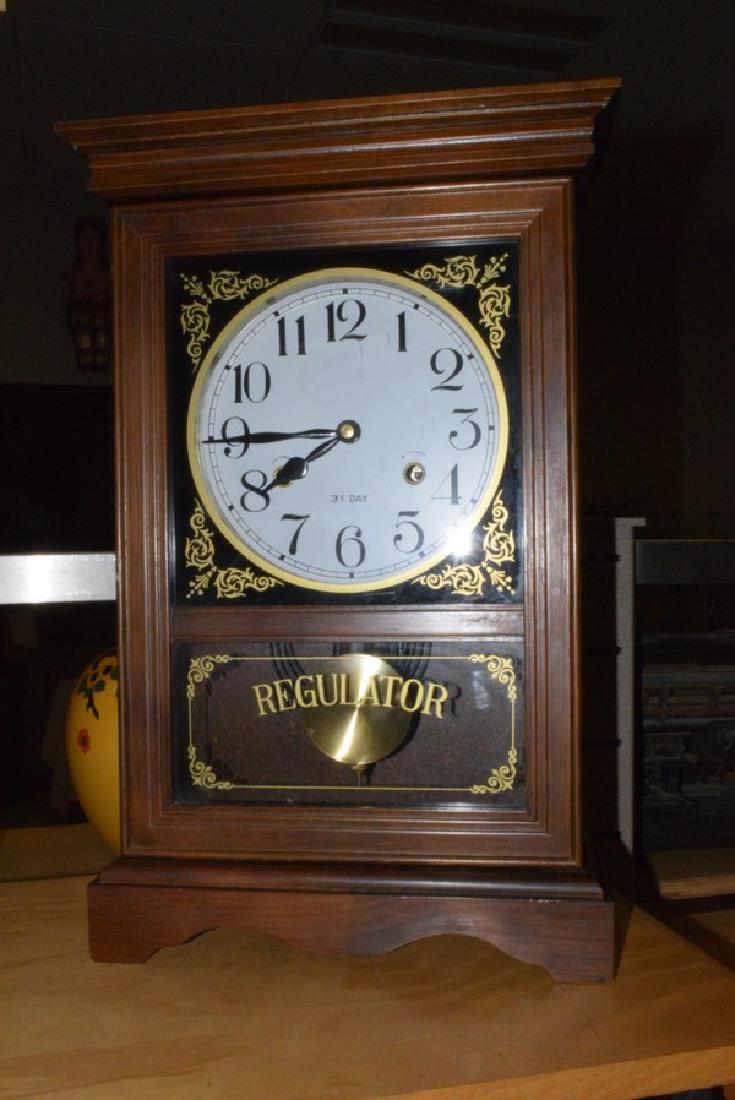 31-DAY KEY WIND REGULATOR CLOCK - NO KEY - DARK ST: 31 DAY KEY WIND REGULATOR CLOCK - 19x 12.5 DARK STAINED WOOD CASE - SMALL CHIP ON DOOR - NO KEY