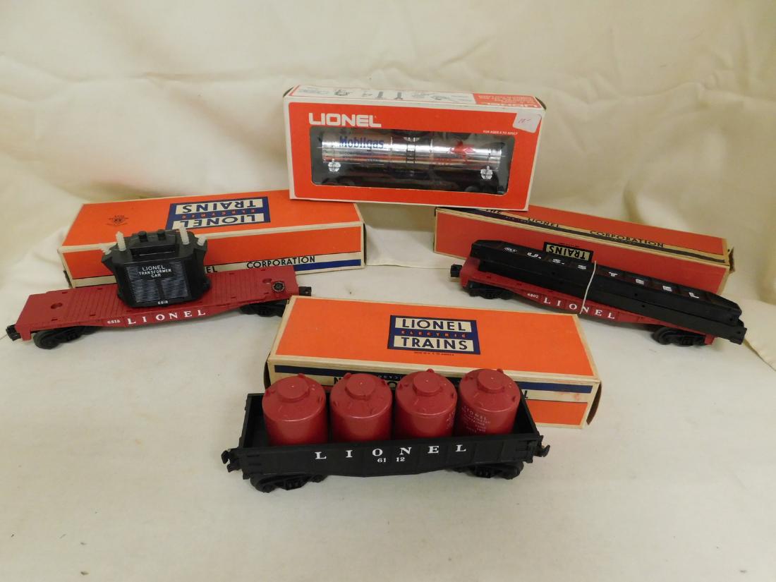 LIONEL NIB - TRANSFORMER CAR - GIRDER FLAT CAR - C: LIONEL NIB - TRANSFORMER CAR - GIRDER FLAT CAR & CANISTER CAR - 6818 TRANSFORMER CAR NIB - 6802 FLAT CAR WITH GIRDERS US STEEL - NIB - BOX FLAP DAMAGE & 6112 CANISTER CAR WITH 4 RED AIR ACTIVATED CONT
