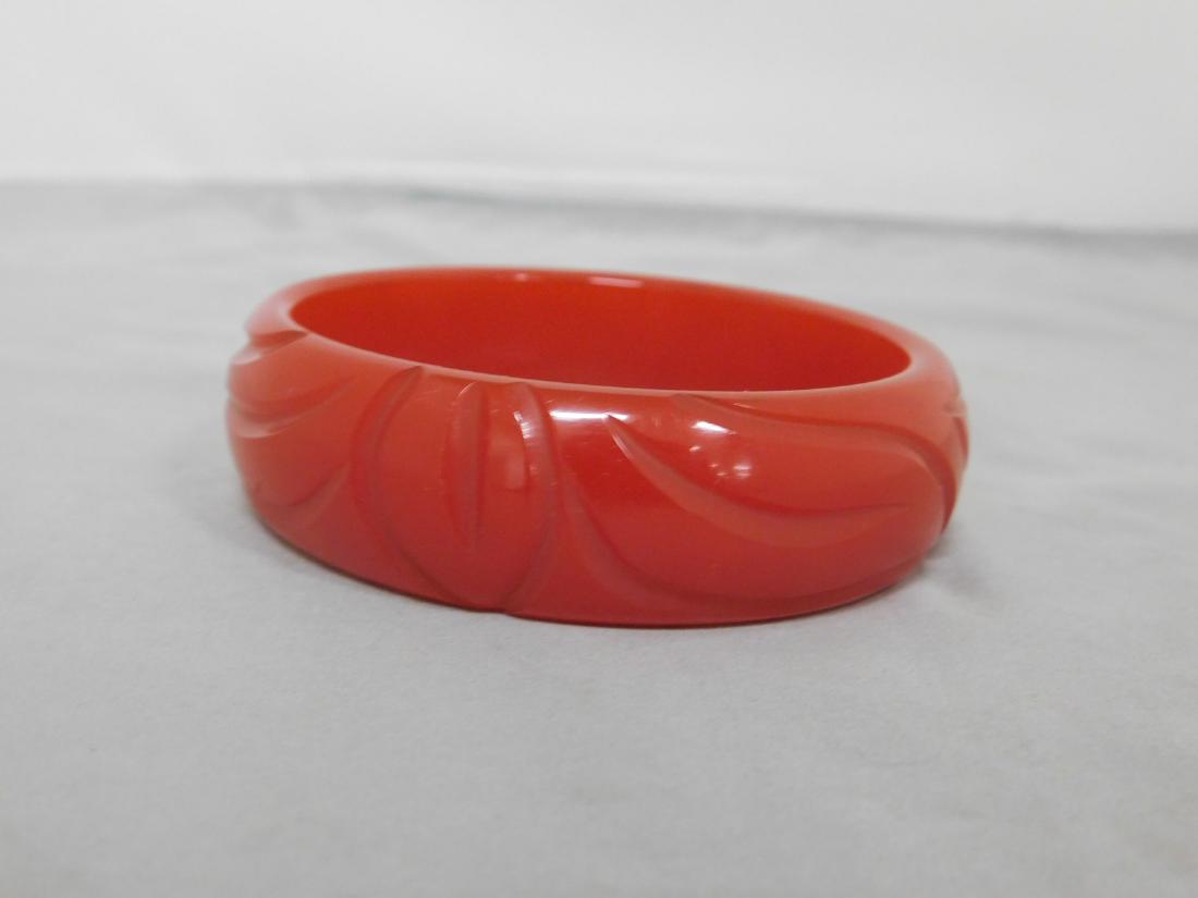 CARVED CHERRY RED BAKELITE BRACELET: CARVED CHERRY RED BAKELITE BRACELET - I INCH WIDTH BANGLE BRACELET