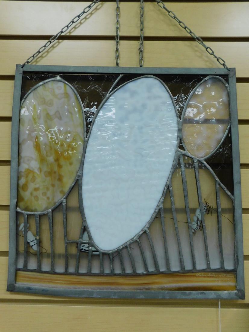 SIGNED STAIN GLASS ARTWORK: SIGNED STAIN GLASS ARTWORK - TITLED CHICKEN LITTLES WET DREAM BY JJ WIND - MEASURES 15 X 15 INCHES