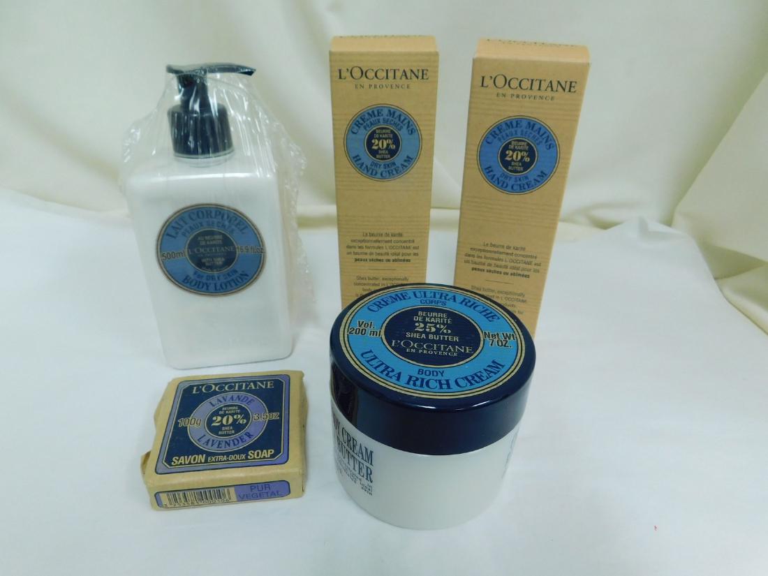 VARIOUS NEW L'OCCITANE PRODUCTS: VARIOUS NEW L'OCCITANE PRODUCTS - LAVENDAR BAR OF SOAP - JAR OF SHEA BUTTER - 16.9 FL OZ BODY LOTION - 2 HAND CREAMS - ALL ARE SEALED AND BOXED