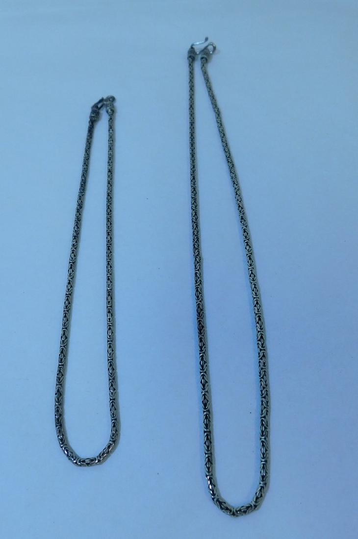 2 .925 SILVER NECKLACES: 2 .925 SILVER NECKLACES - 1 APPROX. 24 - 1 APPROX. 18 - SAME SYTLE - BOTH CLASPS READ INDONESIA .925