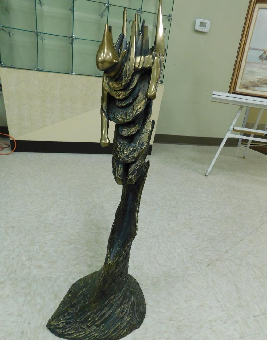 TOM BENNETT BRONZE FIGURE - DOWNHILL RACER: TOM BENNET BRONZE SCULPTURE - DOWNHILL RACER - CIRCA 1980 - NO COA-THIS WAS REVIEWED BY AN EXPERT ACCORDING TO ESTATE PROFESSIONALS AND WAS APPRAISED FOR $2500 AS WELL AS AUTHENTICATED.