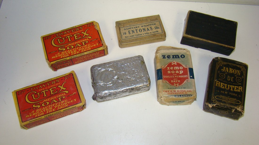 VINTAGE VARIETY OF SOAPS GREAT LABELING: LOT OF 7 VINTAGE SOAPS - (2) THAYERS CUTEX SOAP IN RED AND YELLOW BOXES (SEALED BUT WORN), JABON DE REUTER BLACK AND YELLOW WRAPPED SPANISH DESCRIPTIONS, SANITARY WRAPPER ENONAS WRAPPED, ZEMO SOAP E.W