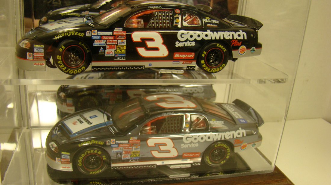2 DALE EARNHARDT '99 MONTE CARLO DIE-CAST CARS: 2 DIE-CAST #3 DALE EARNHARDT '99 MONTE CARLO CARS - LAST LAP OF THE CENTURY '99 MONTE CARLO AND A STANDARD '99 MONTE CARLO - WOOD AND ACRYLIC DISPLAY CASE - APPROX 8.5''x 11'' IN DISPLAY - DISPLAY - M