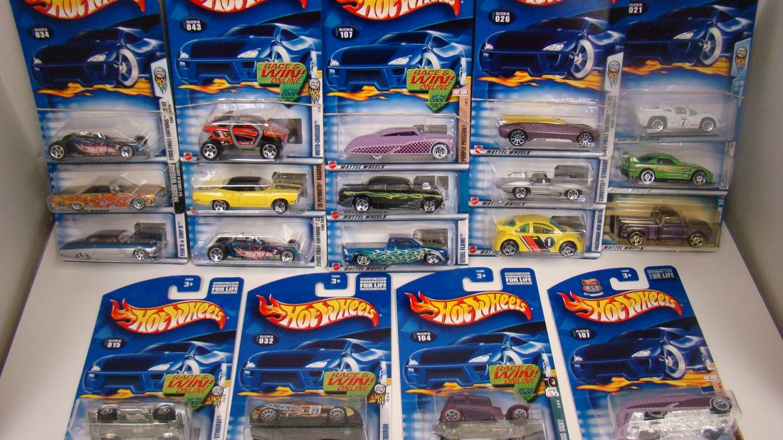 19 VARIOUS 2001-02 HOT WHEELS CARS-NIP: 19 VARIOUS 2002-03 HOT WHEELS CARS - NIP - VARIOUS SERIES - 2002 COLLECTOR NO. 107, 180, 014, 043, 110, 045, 104 AND 107 PLUS 2003 NO. 014, 034, 026, 015, 032, 015, 024, 124, 021, 034, 067 AND 016