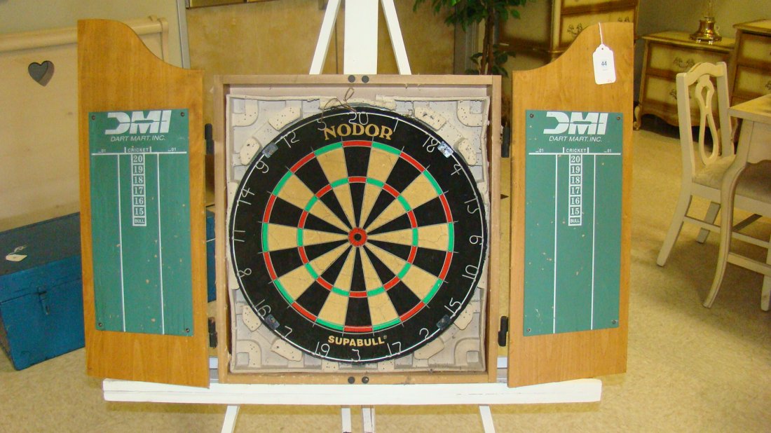 DMI DART BOARD IN WALL CABINET: DMI DART BOARD IN WALL CABINET - NODOR SUPABULL DART BOARD INSIDE CABINET - CHALK BOARDS ON INSIDE DOORS - GOOD CONDITION - NO DARTS - BUYER RESPONSIBLE FOR MAKING SHIPPING ARRANGEMENTS