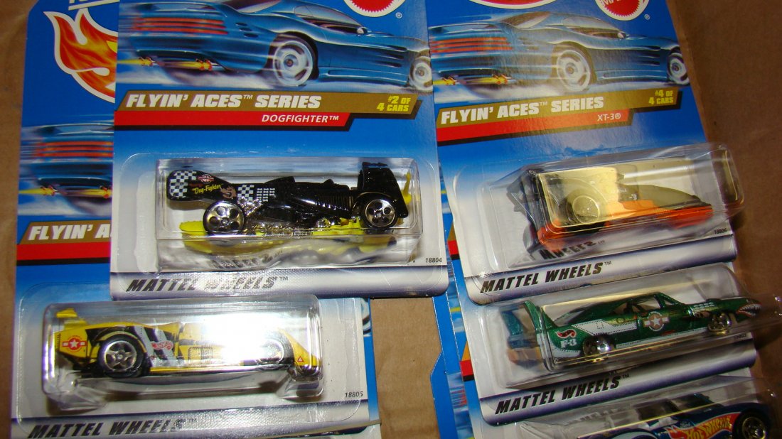 12 VARIOUS NIB HOT WHEELS: 12 VARIOUS NIB HOT WHEELS - 4 1998 FLYING ACES - DOGFIGHTER, SOL-AIRE CX4 XT-3 AND 1970 DODGE CHARGER DAYTONA - 4 RACE TEAM SERIES IV - SHELBY COBRA 427 S/C - '63 CORVETTE, MERCEDES C-CLASS AND '67 CA