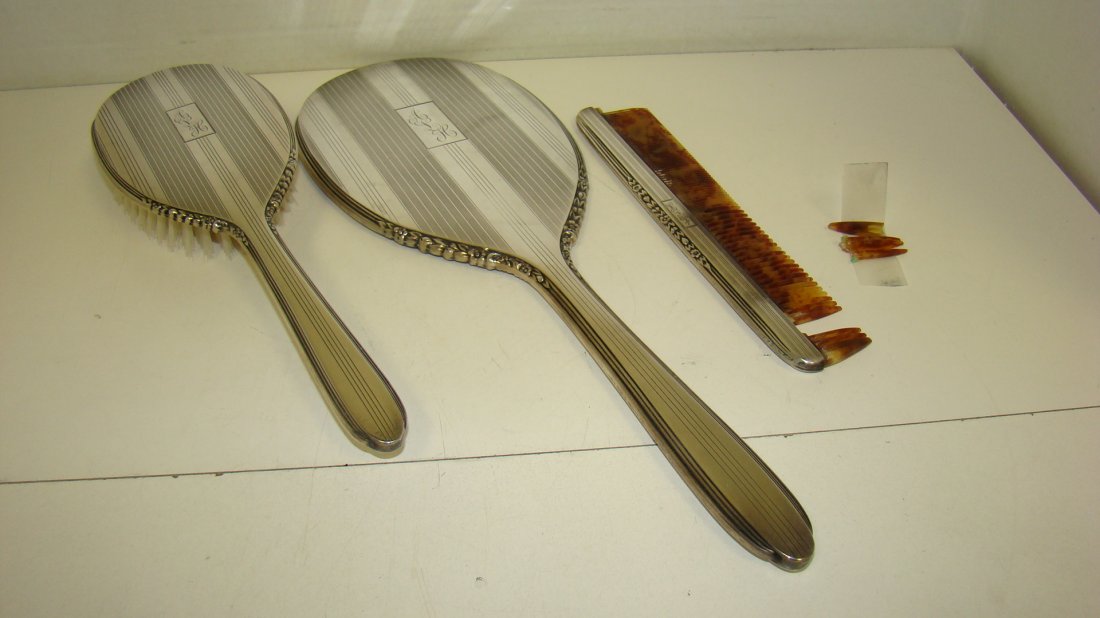VTG 3-PC INT'L STERLING DRESSER SET: VINTAGE 3-PIECE INTERNATIONAL SILVER STERLING DRESSER SET - MONOGRAM ''ALH'' - 10'' BRUSH - 13.75'' HAND MIRROR AND 8'' TORTOISE SHELL COMB (AS-IS) SOME TEETH BROKEN - BRUSH AND MIRROR ARE IN GREAT CO