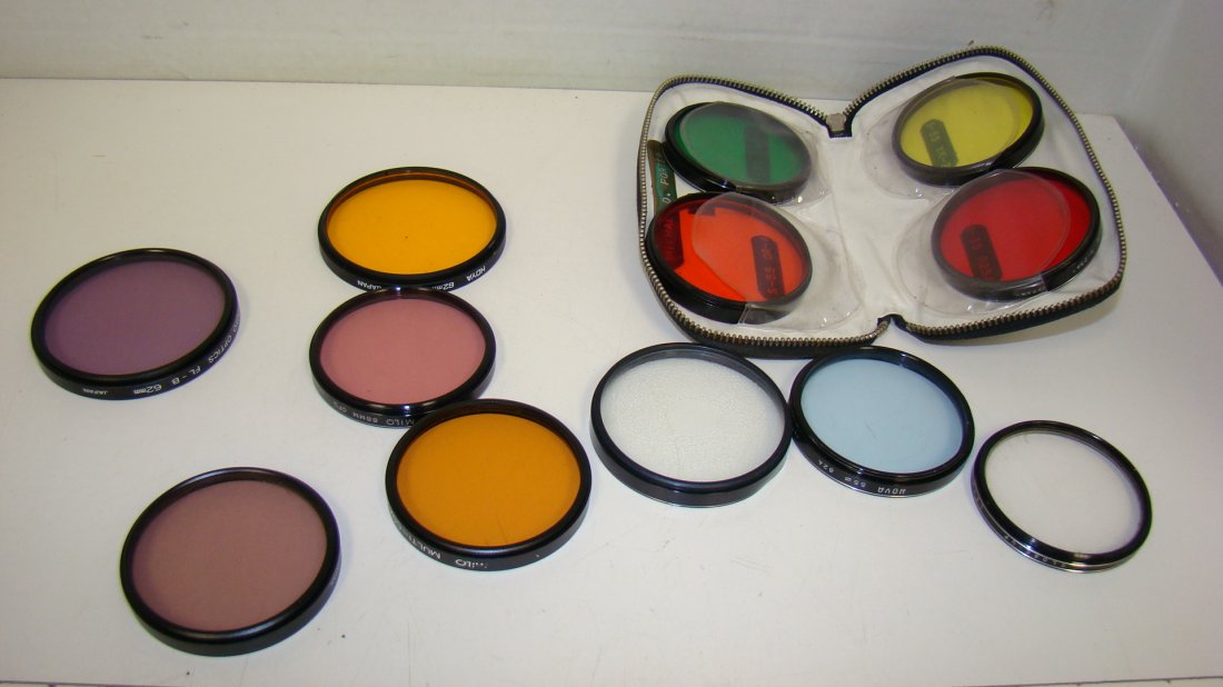 8 VARIOUS CAMERA FILTERS: 12 VARIOUS CAMERA FILTERS INCLUDING: HOYA 62mm O (G) FILTER - TOYO OPTICS FL-B 62mm FILTER - KALT FD-L 55mm FILTER AND A MILO 55mm CFD FILTER AND MORE