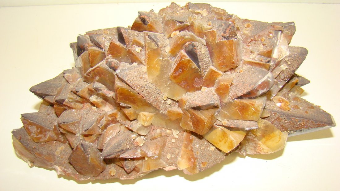 7 LB 2 OZ PC OF HEMATITE: 7 LB 2 OZ PIECE OF NATURAL HEMATITE AND QUARTZ ROCK - BROWN COLORS - APPROX 9.5''x 5''