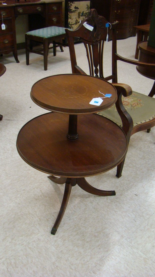 VTG DUNCAN PHYFE STYLE TIER TABLE: VINTAGE DUNCAN PHYFE STYLE MAHOGANY TWO TIER TABLE - 28'' TALL - TOP ROUND TIER 15'' DIAMETER - AND BOTTOM TIER 21.5'' DIAMETER - METAL COVERS ON FEET - NEEDS SOME REFINISHING BUT NOT BAD - NICE PIECE