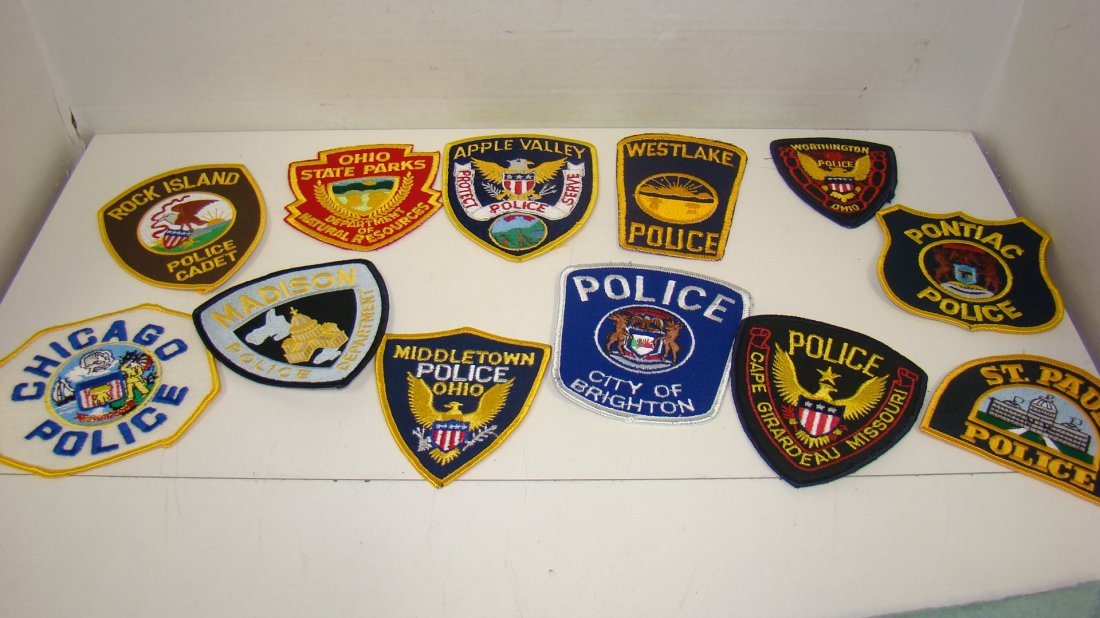 12 VARIOUS LAW ENFORCEMENT PATCHES: 12 VARIOUS LAW ENFORCEMENT SHOULDER PATCHES - ROCK ISLAND POLICE CADET - CHICAGO POLICE - MADISON POLICE - OHIO STATE PARKS DEPT OF NATURAL RESOURCES - MIDDLETOWN OHIO POLICE - CAPE GIRARDEAU MISSOURI