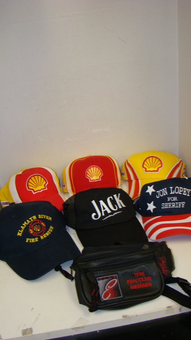 8 #29 KEVIN HARVICK HATS & A FANNY PACK: 8 VARIOUS NASCAR AND OTHER HATS - KLAMATH RIVER FIRE RESCUE HAT - JIM CLICK FORD HAT - SMOG CHECK HAT - 3 #29 KEVIN HARVICK/SHELL OIL CO HATS - JACK DANIELS HAT AND A JON LOPEY FOR SHERIFF HAT PLUS A 