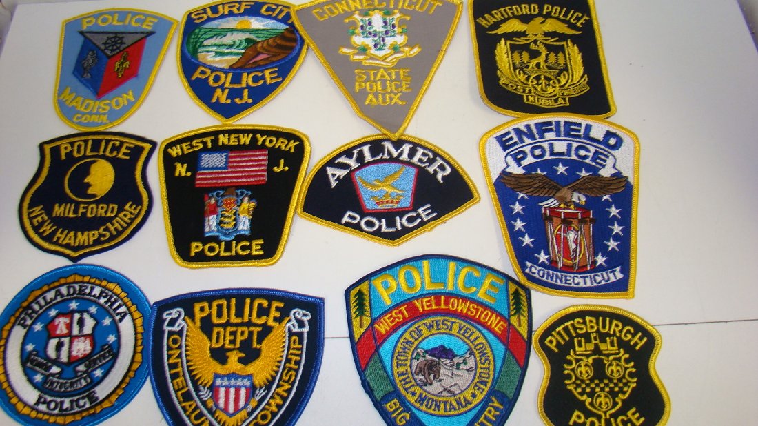 12 VARIOUS LAW ENFORCEMENT SHOULDER PATCHES: 12 VARIOUS LAW ENFORCEMENT SHOULDER PATCHES - CONNECTICUT STATE POLICE AUX. - HARTFORD POLICE - MILFORD NEW HAMPSHIRE POLICE - AYLMER POLICE - WEST NEW YORK N.J. POLICE - ENFIELD CONNECTICUT POLICE - 