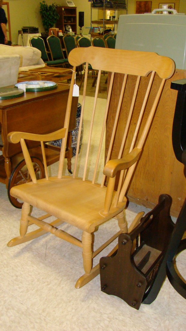 LIGHT WOOD ROCKING CHAIR & A MAGAZINE HOLDER: LIGHT WOOD ROCKING CHAIR - SPINDLE BACK AND A VINTAGE DARK STAINED WOOD MAGAZINE HOLDER - BUYERS RESPONSIBLE FOR MAKING SHIPPING ARRANGEMENTS