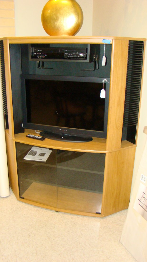 CORNER TV CABINET: CORNER TV CABINET - UPPER SPACE FOR DVD PLAYER - LEFT SIDE HAS UPPER CD RACK - BOTTOM GLASS DOORS FOR STORAGE - MIDDLE OPEN SECTION MEASURES APPROX 26''x 31'' - 59''x 12''x 52'' - GOOD CONDITION - BUY
