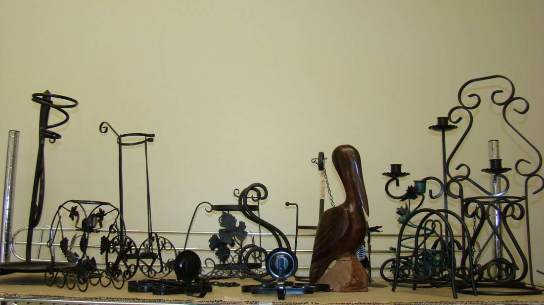 VARIOUS BLCK METAL DECORATIVE ITEMS: SHELFLOT OF VARIOUS BLACK METAL DECORATIVE ITEMS - CANDLE HOLDERS - WINE BOTTLE HOLDERS - WALL SCONCES - AND MORE