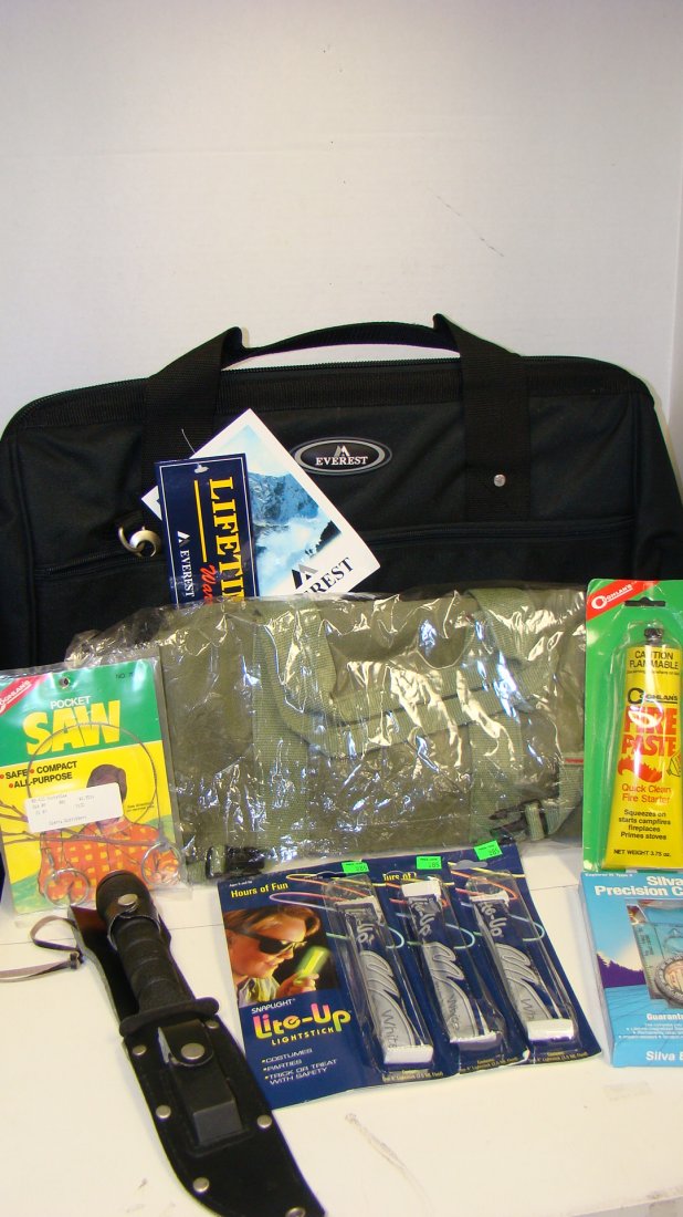 VARIOUS CAMPING ITEMS-SOME NEVER OPENED: VARIOUS CAMPING ITEMS - MOST NEVER OPENED - SURVIVAL KNIFE WITH COMPASS ON ONE END - COMPASS COMES OFF AND SMALL ACCESSORIES INSIDE - 3 SNAP LIGHTS - FIRE PASTE - SILVA PRECISSION COMPASS POCKET SAW -