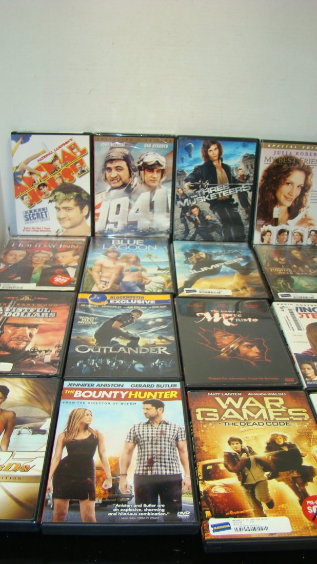 24 VARIOUS DVD MOVIES: 24 VARIOUS DVD MOVIES - ANIMAL HOUSE - 1941 - THE THREE MUSEKETEERS - MY BEST FRIENDS WEDDING - PIRATES OF THE CARIBBEAN 2 - JUMPER - BLUE LAGOON - HOLIDAY INN - OUTLANDER - SWING VOTE - THE X-FILES -