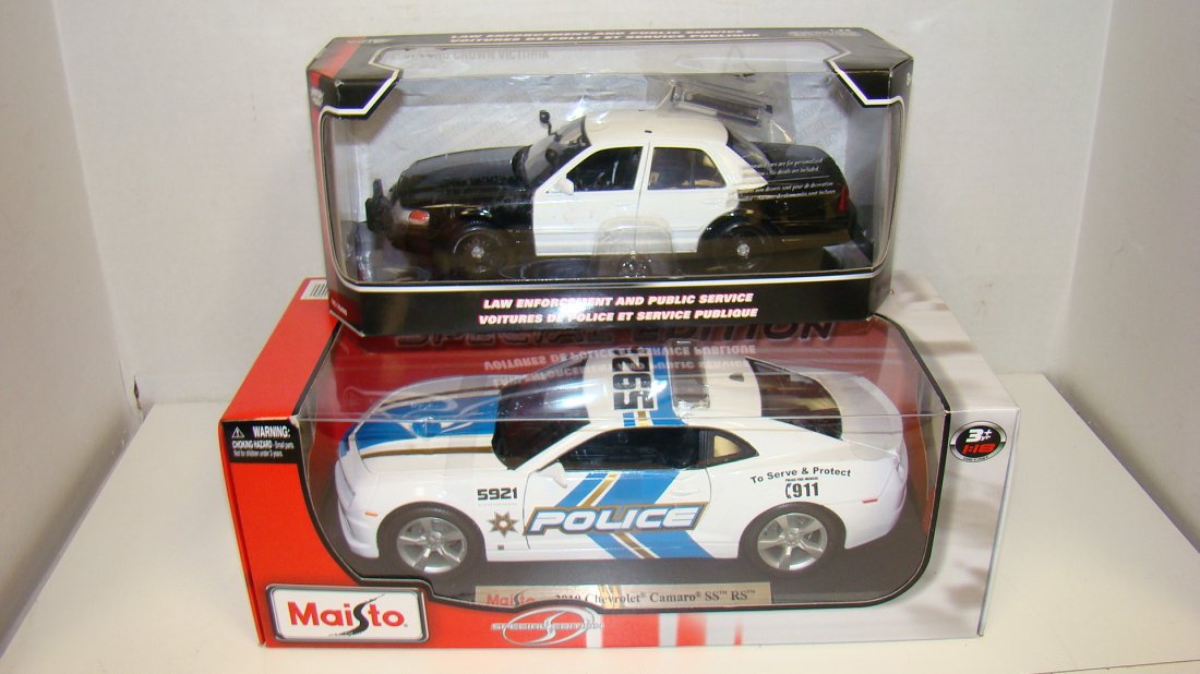 NIB MOTOMAX & MAISTO DIE-CAST POLICE CARS: 2009 NIB MOTOMAX DIE-CAST POLICE CAR - NO MARKS - 1:24 SCALE - BLACK AND WHITE PLUS A NIB MAISTO 2010 CHEVROLET CAMARO SS RS - 1:18 SCALE DIE-CAST POLICE CAR - BOTH IN ORIGINAL BOXES