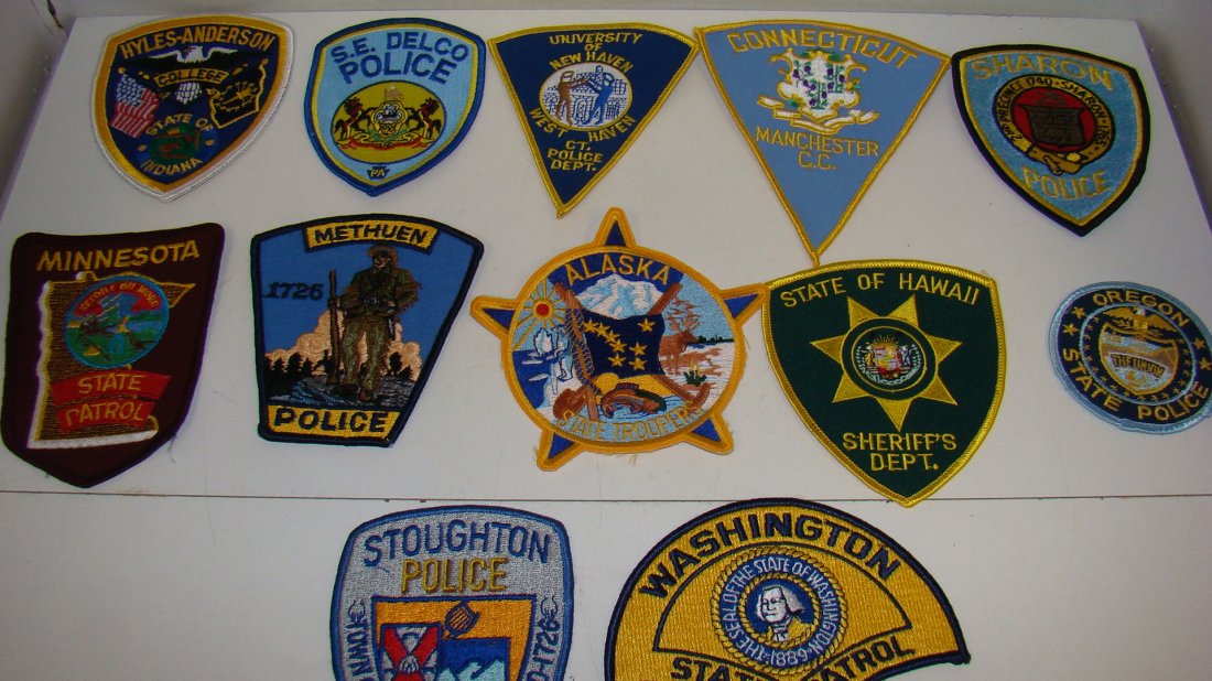 12 VARIOUS LAW ENFORCEMENT PATCHES: 12 VARIOUS LAW ENFORCEMENT SHOULDER PATCHES - UNIVERSITY OF NEW HAVEN - STATE OF INDIANA HYLES-ANDERSON COLLEGE - MANCHESTER COUNTY C.C. - SHARON POLICE - STOUGHTON POLICE - WASHINGTON STATE PATROL - 