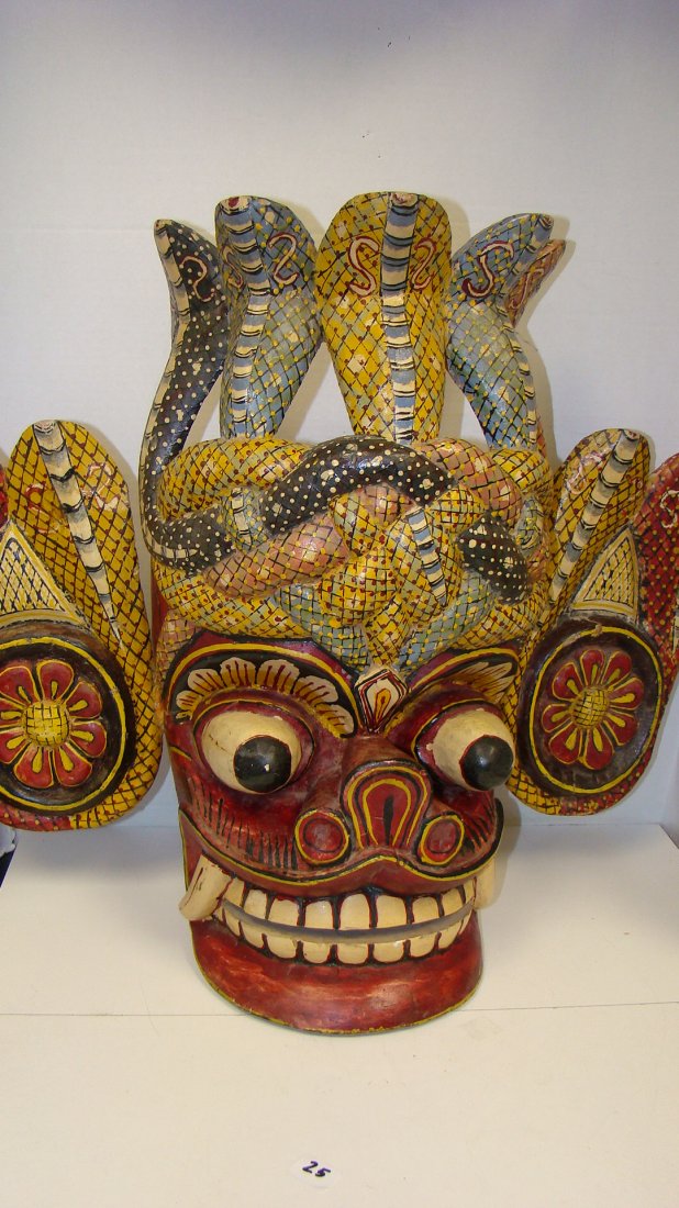LG CARVED & PAINTED INDONESIAN WOOD MASK: LARGE CARVED AND PAINTED INDONESIAN WOOD MASK - RED, YELLOW, BLACK AND OTHER COLORS - BIG EYES AND EARS - EARS ARE REMOVABLE - APPROX 20''x 26'' - GOOD CONDITION - BUYERS RESPONSIBILITY TO MAKE SHIPPI